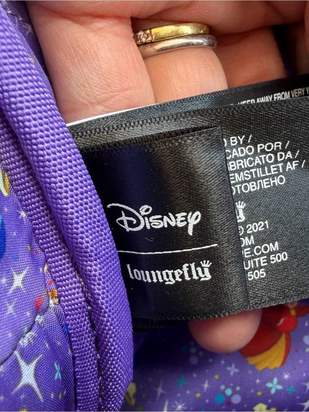 Loungefly Lavender and Sky Blue Rapunzel Castle Mini Backpack